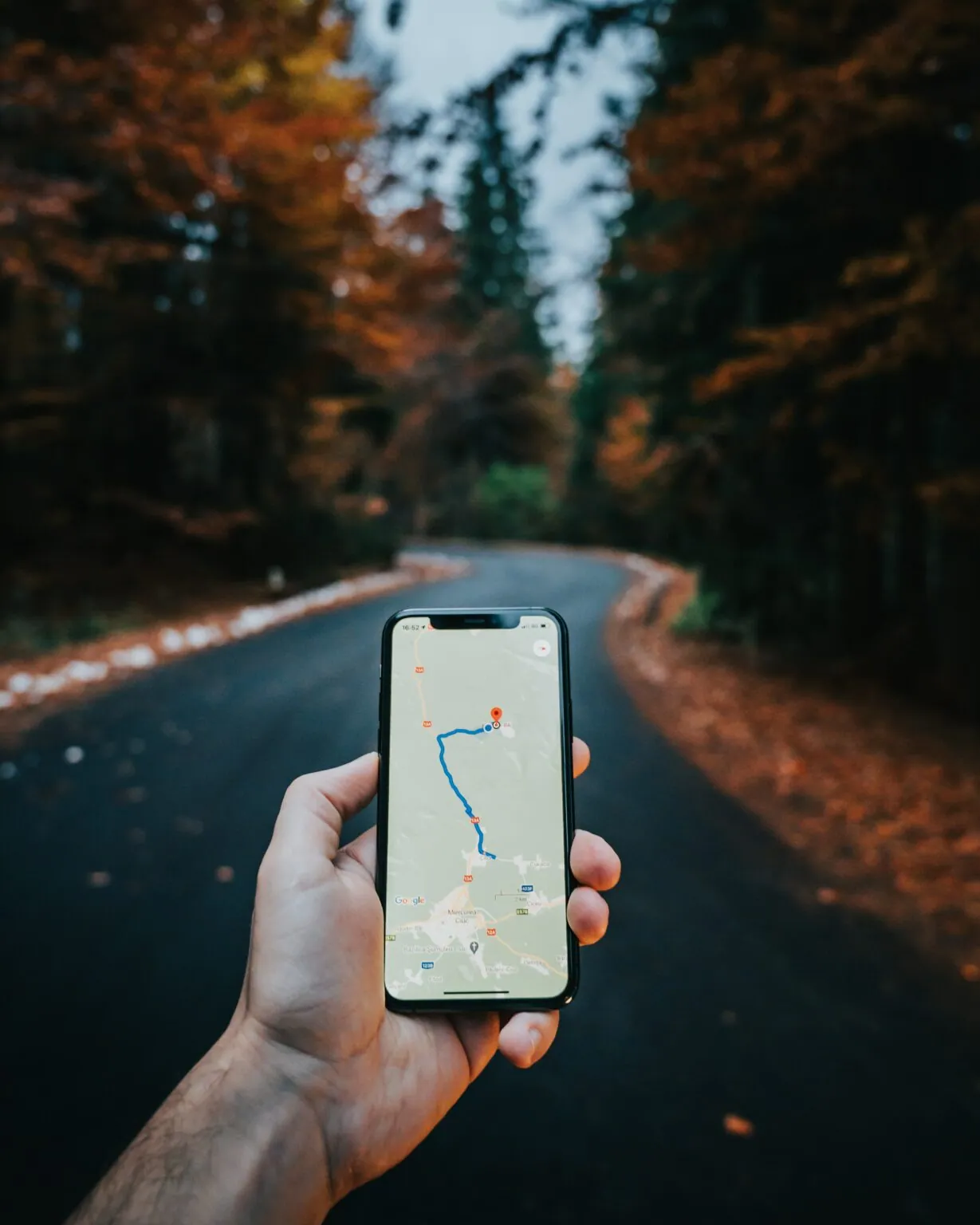 Mobile phone with a map showing. It's important to add the precise location of a property on the real estate portal.